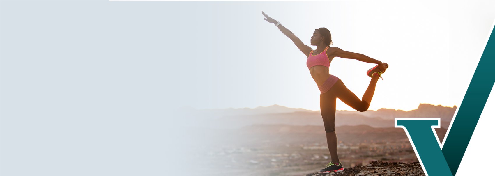 Woman doing yoga in a secluded outdoors area 